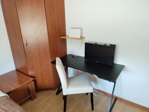 TV a/nebo společenská místnost v ubytování Apartman Grbić