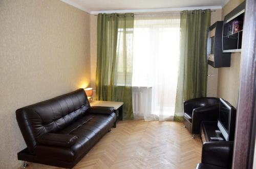 Area soggiorno di Cosy-2 Apartments on Kievskaya