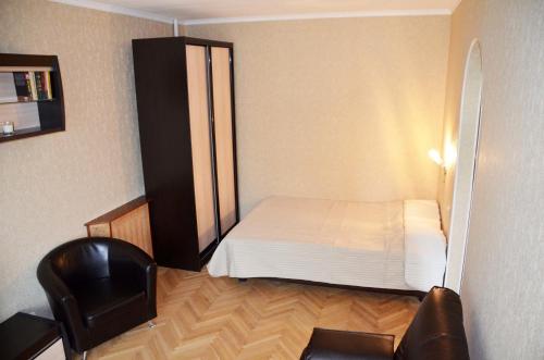 Letto o letti in una camera di Cosy-2 Apartments on Kievskaya