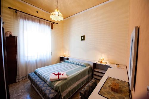 Posteľ alebo postele v izbe v ubytovaní Villa del Tramonto