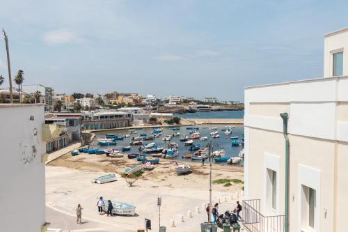 a group of boats in the water near a harbor at Suite N12 - Luxury Apartment in Bari
