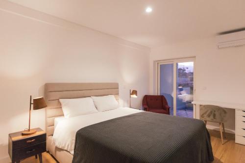 Postel nebo postele na pokoji v ubytování Master Deco Gem in Cascais