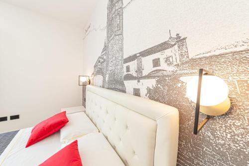 Ένα ή περισσότερα κρεβάτια σε δωμάτιο στο Eleonore Elegant Rooms