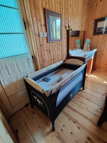 an overhead view of a room with two beds at Pervolaris Cottages 2 in Goudhi