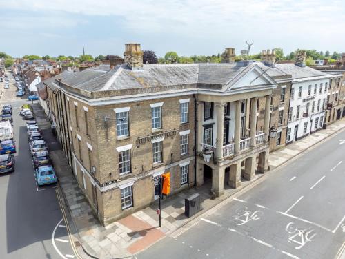 an aerial view of a large brick building on a city street at Mercure Salisbury White Hart Hotel & Apartments in Salisbury