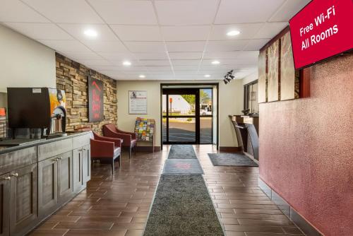 a lobby of a hospital with a waiting room at Red Roof Inn Allentown South in Allentown