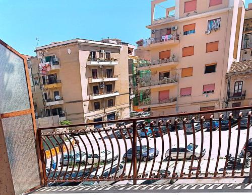 a view of a city from a balcony with buildings at Casa al centro in Palermo