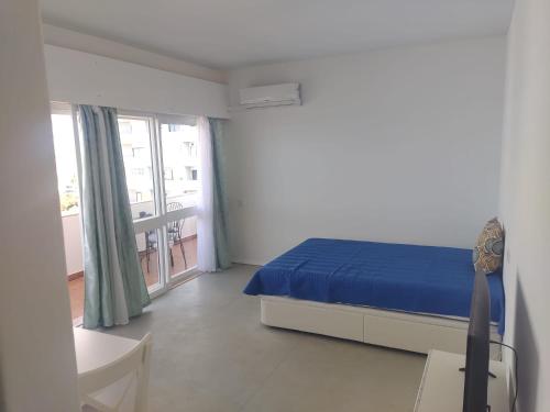 Postel nebo postele na pokoji v ubytování Alvor Beach Apartment