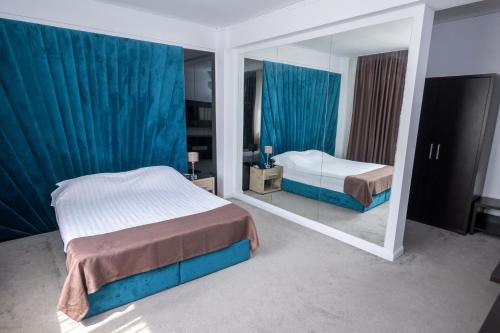 Postel nebo postele na pokoji v ubytování Hotel Maryiotis
