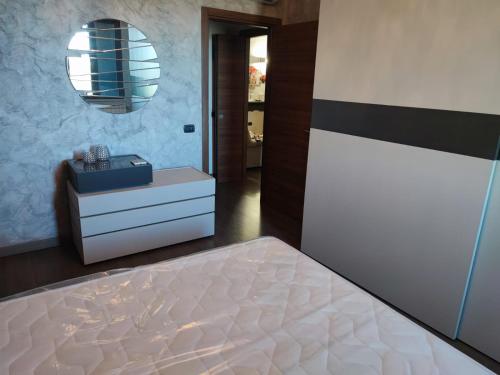 Een bed of bedden in een kamer bij Casa di Francesca