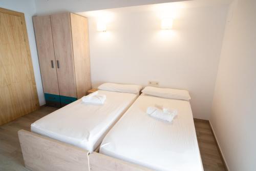 Cama ou camas em um quarto em Lo Molí de Bot