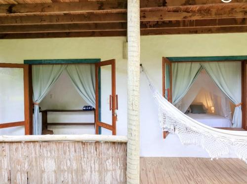 Llit o llits en una habitació de Caiçara Bangalôs Barra Grande