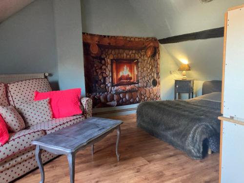 Et opholdsområde på Chez Lilly & Cie 10 à 12 personnes avec sauna et piscine