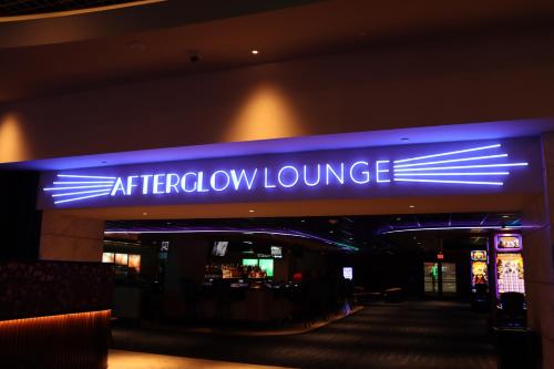 a blue sign that says airbury lounge in a building at J Resort in Reno