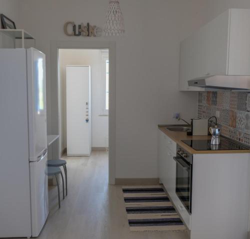 Una cocina o zona de cocina en Pugliamandia
