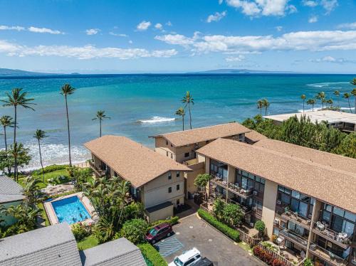 an aerial view of a house and the ocean at C7 Hono Kai in Wailuku
