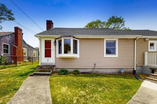 a house with a red door and a yard at Sunset Cove Retreat in Wareham