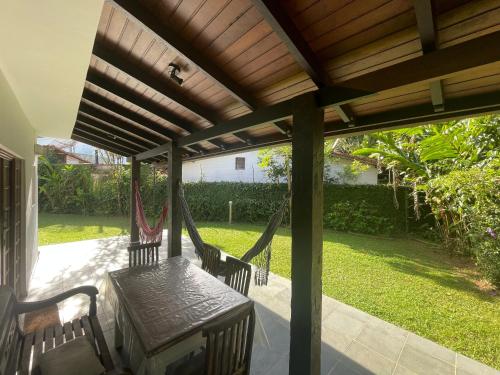 Taman di luar Condominio Frente Praia Boissucanga