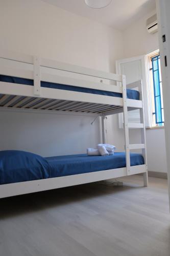 Cama o camas de una habitación en Pugliamandia