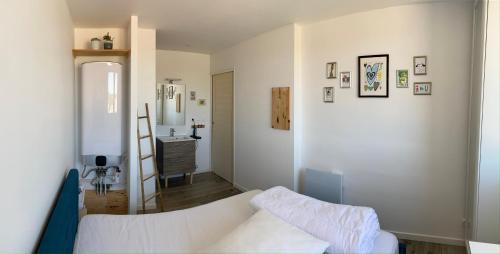 Posteľ alebo postele v izbe v ubytovaní Appartement 2P à 1 min de la mer