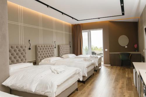 Postel nebo postele na pokoji v ubytování Hotel PortSide GF