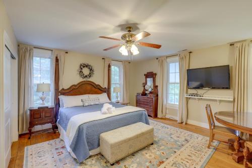 a bedroom with a bed and a ceiling fan at Mtn Views and Epic Sunsets Private Weaverville Home in Weaverville
