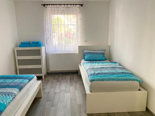 Postel nebo postele na pokoji v ubytování Apartment 13