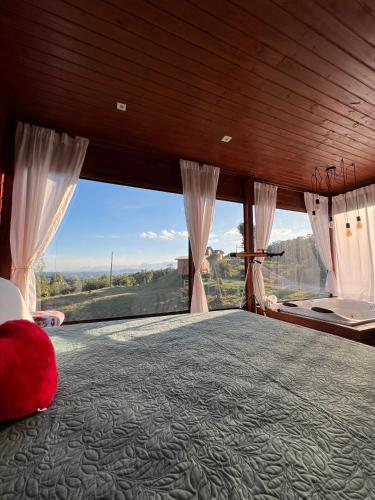 Postel nebo postele na pokoji v ubytování Cabanas Românticas em meio a Natureza - Anitápolis/SC - CB05