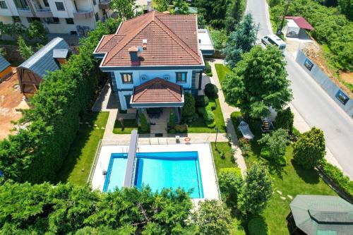 an overhead view of a house with a swimming pool at Heaven White Palace in Bostancı