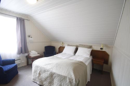 Tempat tidur dalam kamar di Lunde Turiststasjon