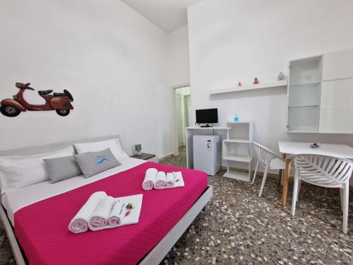Postel nebo postele na pokoji v ubytování Meraviglia d'Otranto
