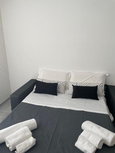 Ένα ή περισσότερα κρεβάτια σε δωμάτιο στο Maison 115