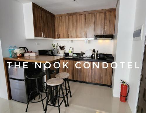 Kuchyň nebo kuchyňský kout v ubytování TheNook Condotel