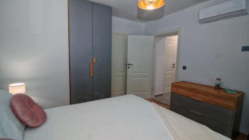 Ένα ή περισσότερα κρεβάτια σε δωμάτιο στο Casa Capris
