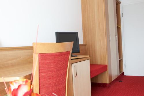TV a/nebo společenská místnost v ubytování Gästehaus am Rastberg