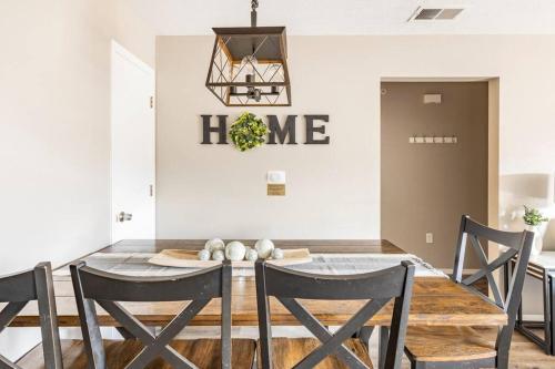 a dining room with a table and chairs at 3BR Branson Condo PrimeLocation! in Branson