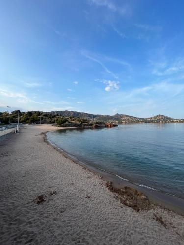 a view of a beach with the water at CAP ESTEREL Appartement in Agay - Saint Raphael