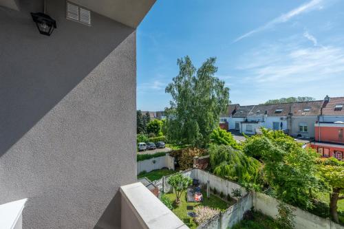 a view from the balcony of a apartment building at Le Petit Riad in Vilvoorde