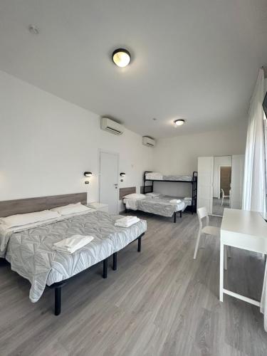 Postel nebo postele na pokoji v ubytování Hotel Laika