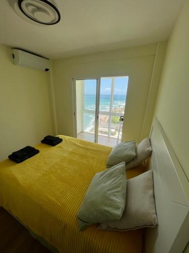 Posteľ alebo postele v izbe v ubytovaní @SeaFront 1
