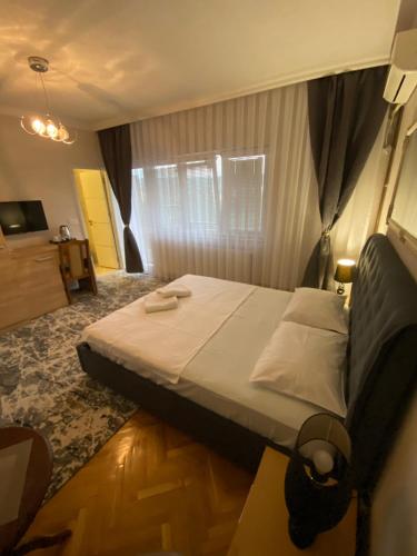 Ένα ή περισσότερα κρεβάτια σε δωμάτιο στο Apartment Perla
