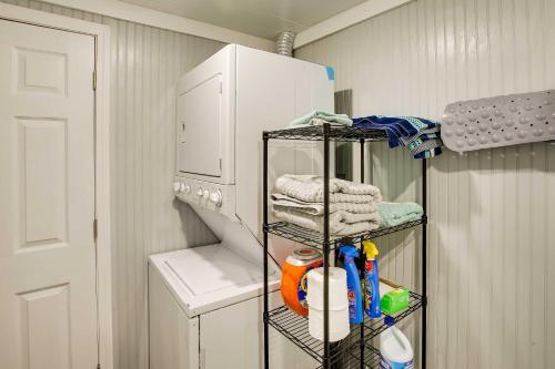 a towel rack in a laundry room with a washing machine at Byrdstown Cabin - with Fire Pit, Near Marina and Lake! in Frogue