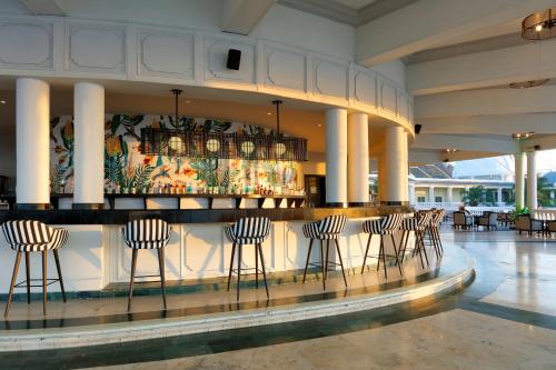 a bar in the lobby of a resort at Grand Palladium Jamaica Resort & Spa All Inclusive in Lucea