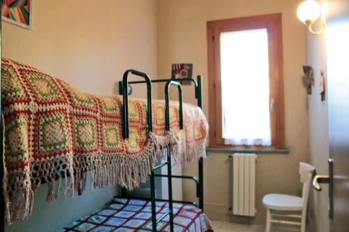 Poschodová posteľ alebo postele v izbe v ubytovaní Magma Guest House