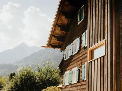 a building with a view of a mountain at Chalet in Montafon with Private Sauna & Views in Vandans
