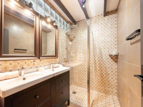 a bathroom with a sink and a shower at Villa Jen'uka with private pool in Callian