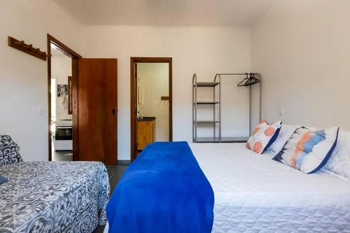 Ένα ή περισσότερα κρεβάτια σε δωμάτιο στο Flat JUQUEHY INCRÍVEL COM PISCINA E AR CONDICIONADO