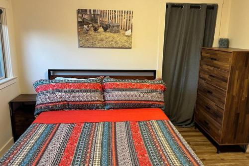 a bedroom with a bed with a rug on it at Julian Orchard Ranch in Santa Ysabel