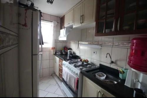 Cuisine ou kitchenette dans l'établissement Apartamento Na Cardeal da Silva