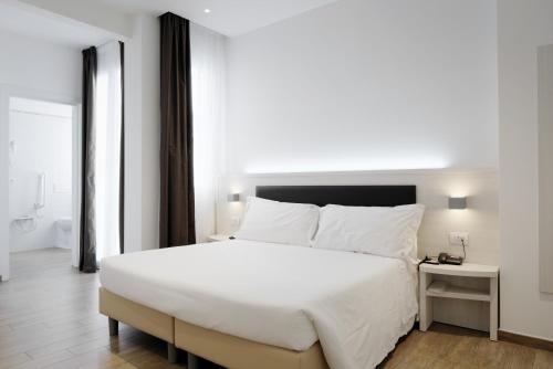 Cama o camas de una habitación en Hotel Cantoria